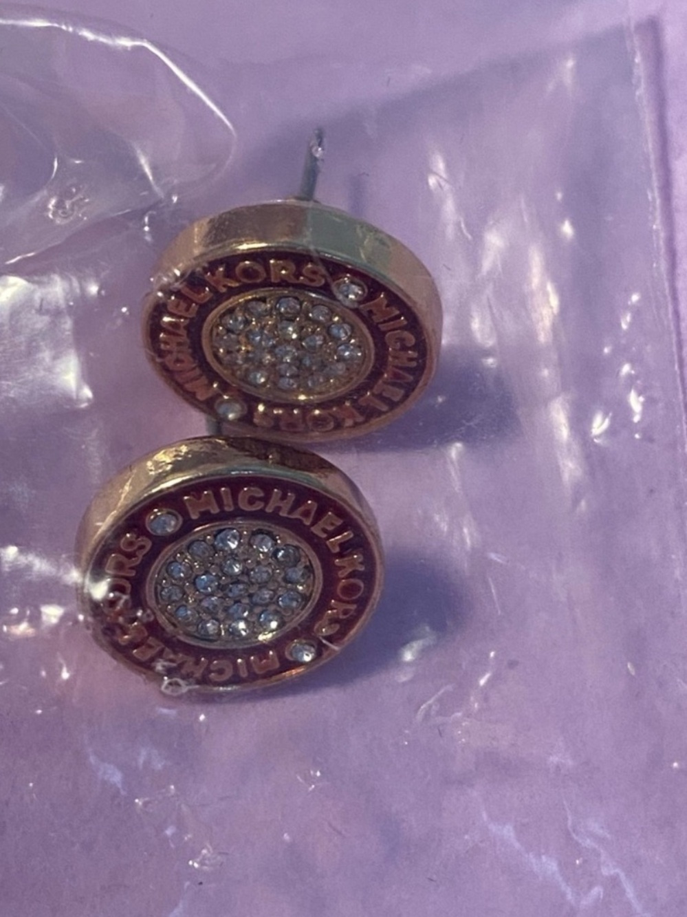 New Michael Kors stud earrings
Red